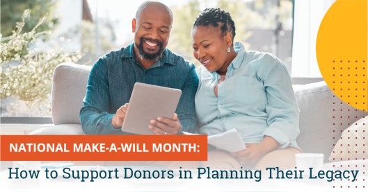 Photo of an African American couple sitting on a couch in front of a window. The man is bald with a greying black beard. He is wearing a dark blue button down and is holding tablet. The woman on the right has braids close to her head and is wearing a light blue button down. She is holding some papers while looking over the man's shoulder at the tablet. Text in the lower left corner of the graphic says "National Make-a-Will Month: How to Support Donors in Planning Their Legacy."